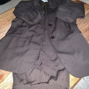 Brown pinstriped jacket and slacks